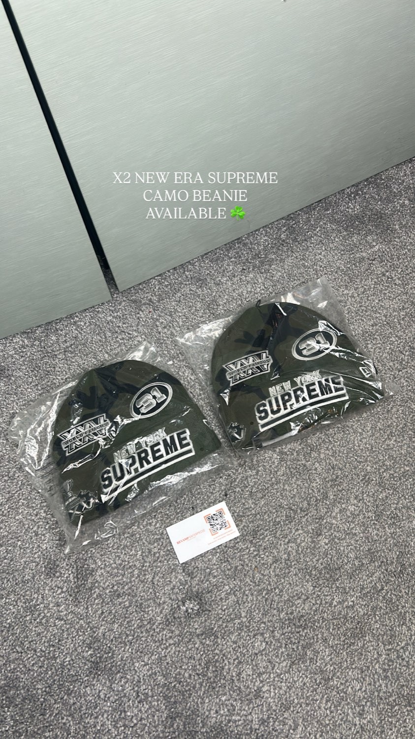 Two Supreme New Era camo beanies, still bagged