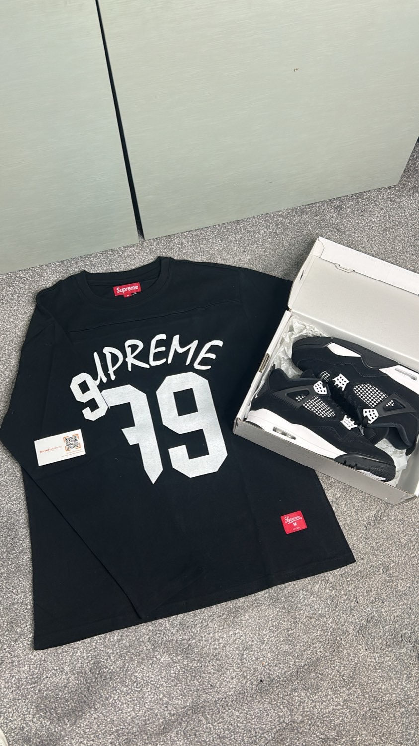 Supreme 79 jersey next to Jordan 4 sneakers in their box
